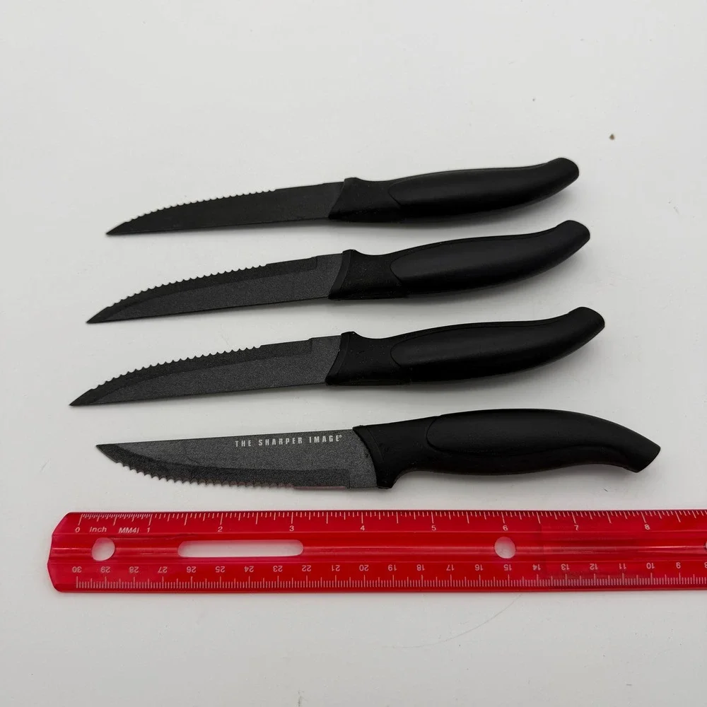 The Sharper Image 4 Piece Steak Knife Set Black Non-Stick Serrated Blade Utility